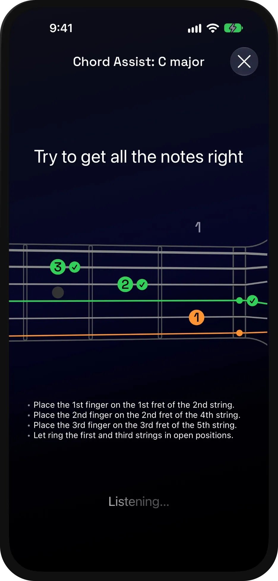 Chord Assist in Guitar Wiz, listening for a C major chord. Three notes have been played correctly and are marked in green, each with a tick beside it; a fourth is still orange and has no tick. Below the fretboard, written instructions read: place the 1st finger on the 1st fret of the 2nd string, the 2nd finger on the 2nd fret of the 4th string, the 3rd finger on the 3rd fret of the 5th string, and let the first and third strings ring open.