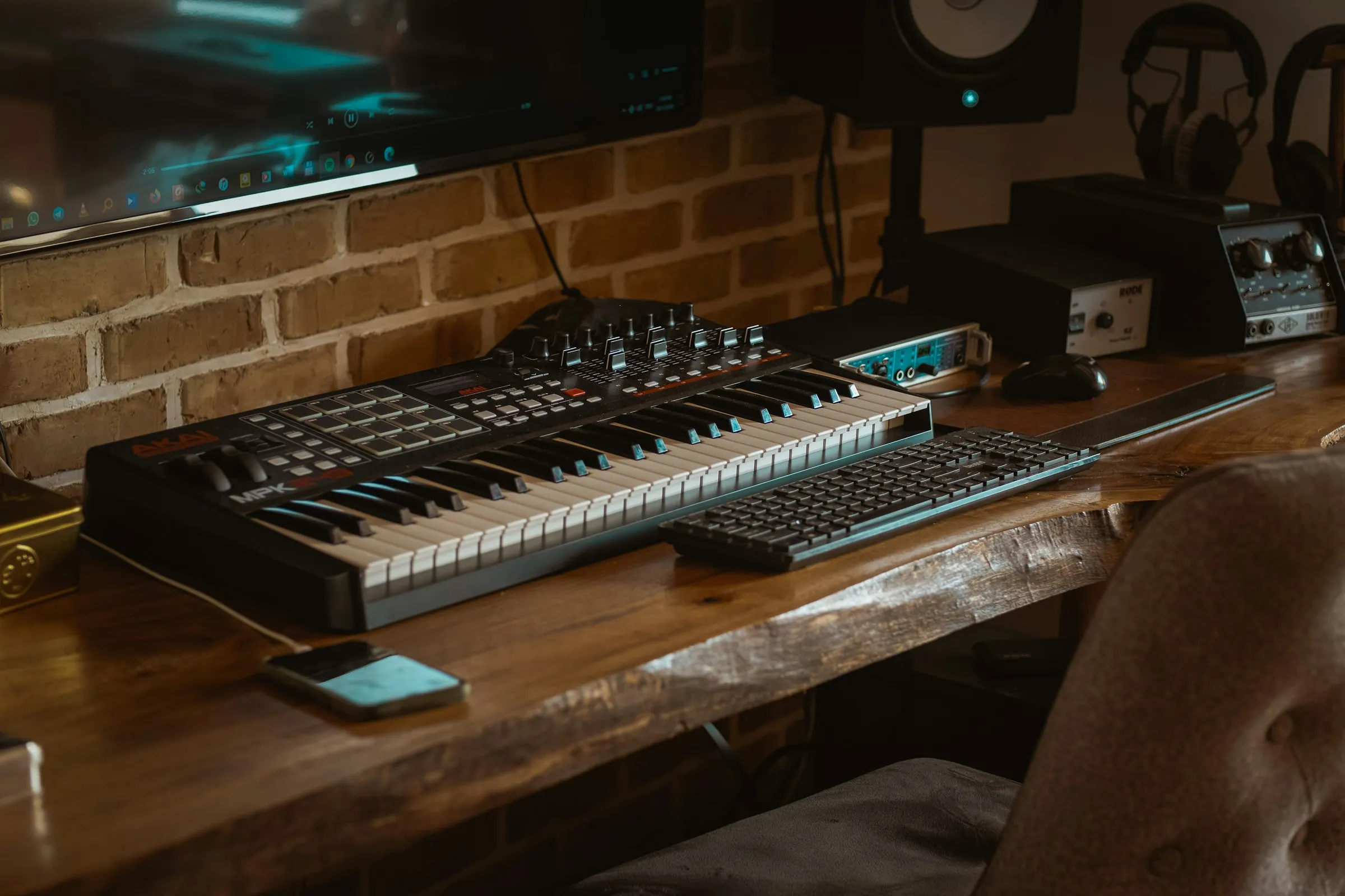black and white computer keyboard on brown wooden table